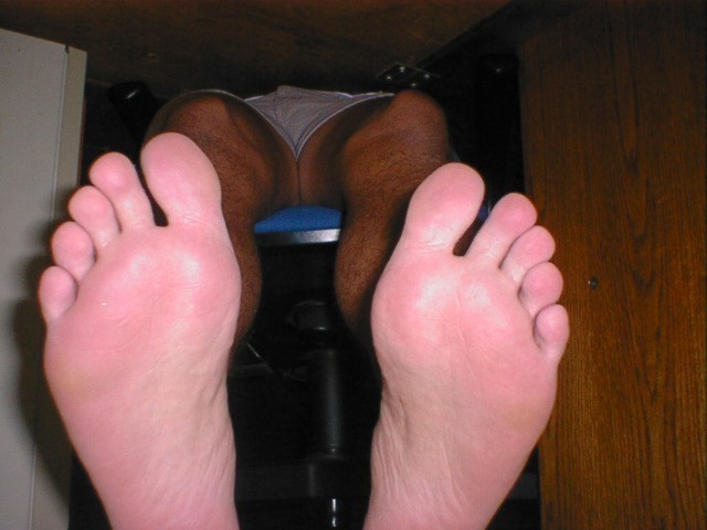 Soles in your face under desk