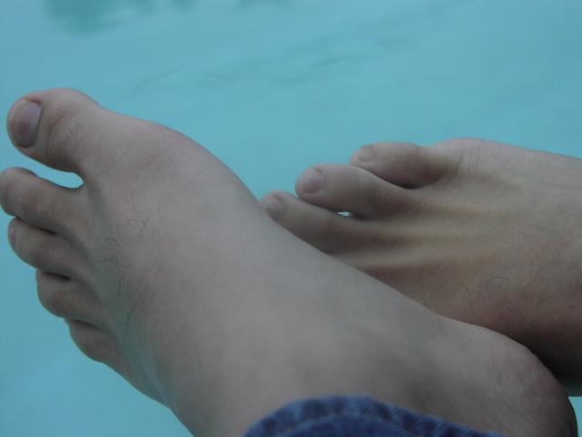 Frank shows his feet near pool