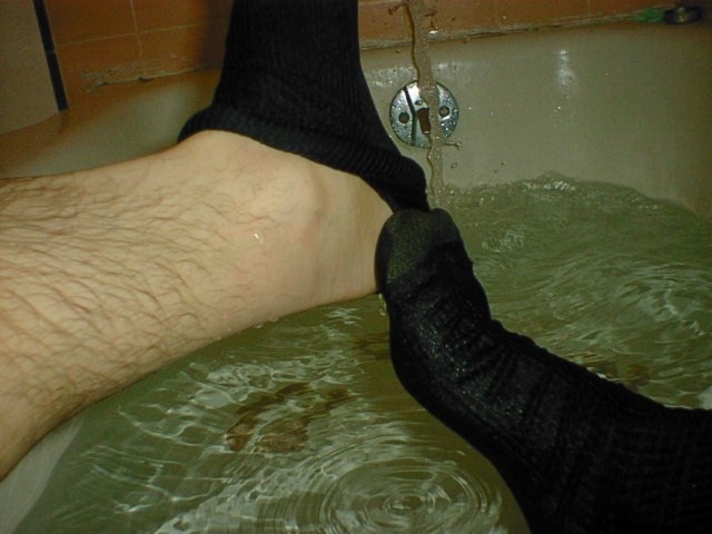 Taking off my wet socks