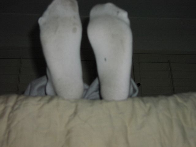 My dirty socks on my bed