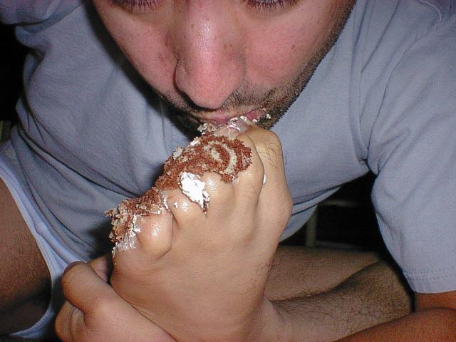 Toes covered in frosting and cake