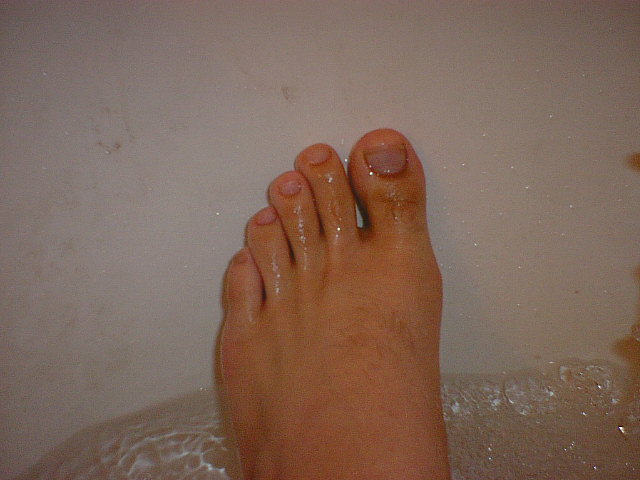 Wet foot in bath