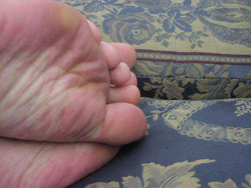 My barefeet on the couch