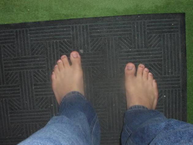 My feet outside on mat