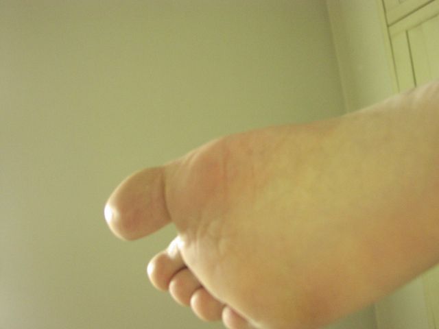 My foot above a shrunken slave