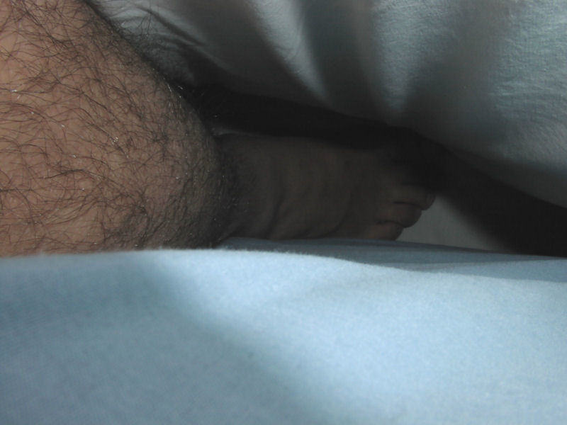 My legs in bed