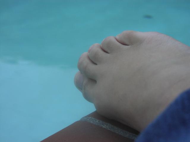 My sweaty feet near pool