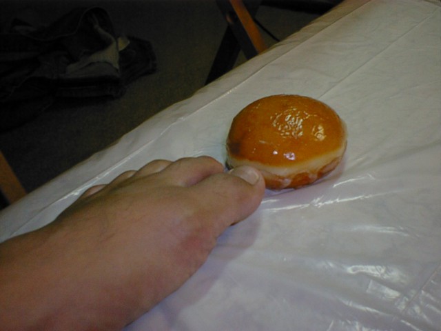 My feet meets a doughnut