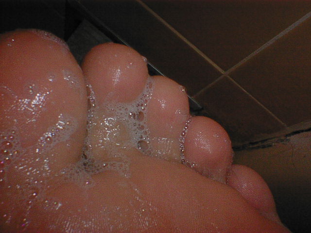 My toes covered with soap